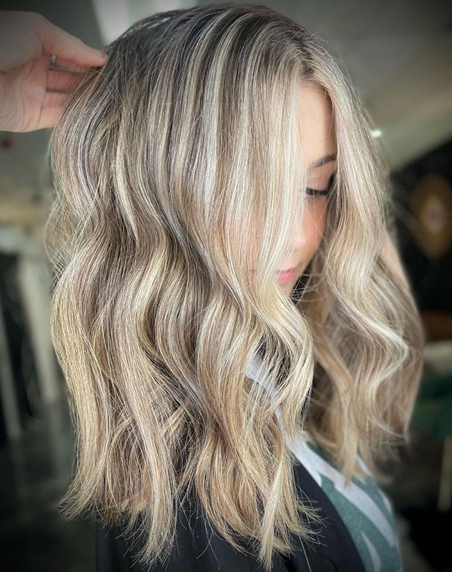 Blonde hair client at With a Kay Salon